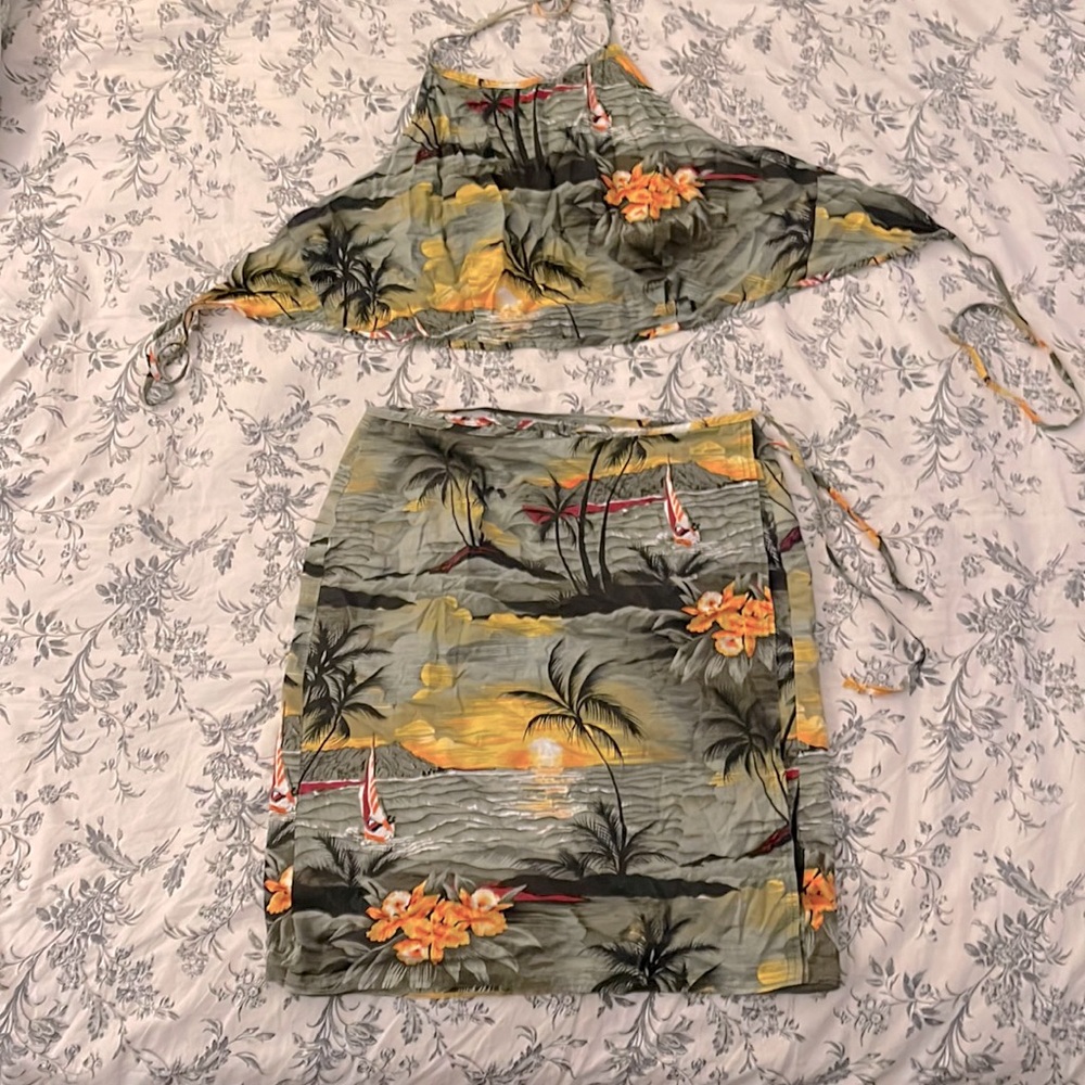 Hawaiian wrap around skirt and tie back top. Size L